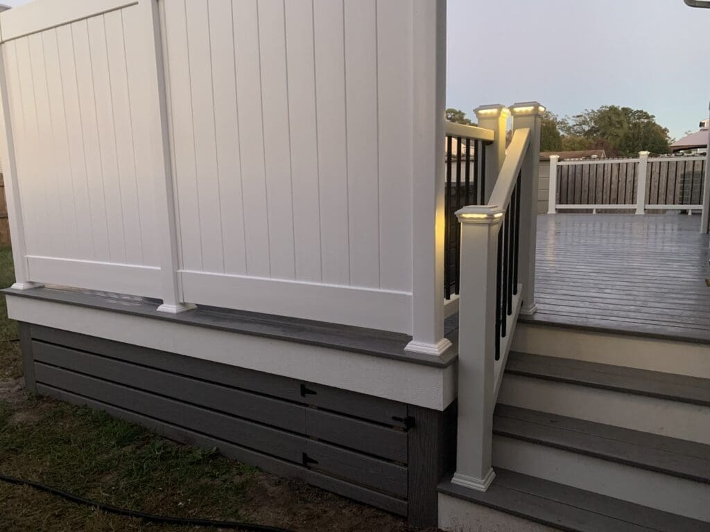 White deck railing and steps by B&B Decks