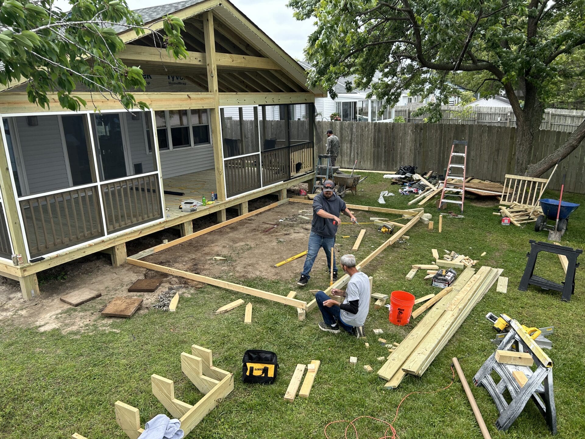 Elevated composite deck with railing overlooking open water, built by B&B Decks