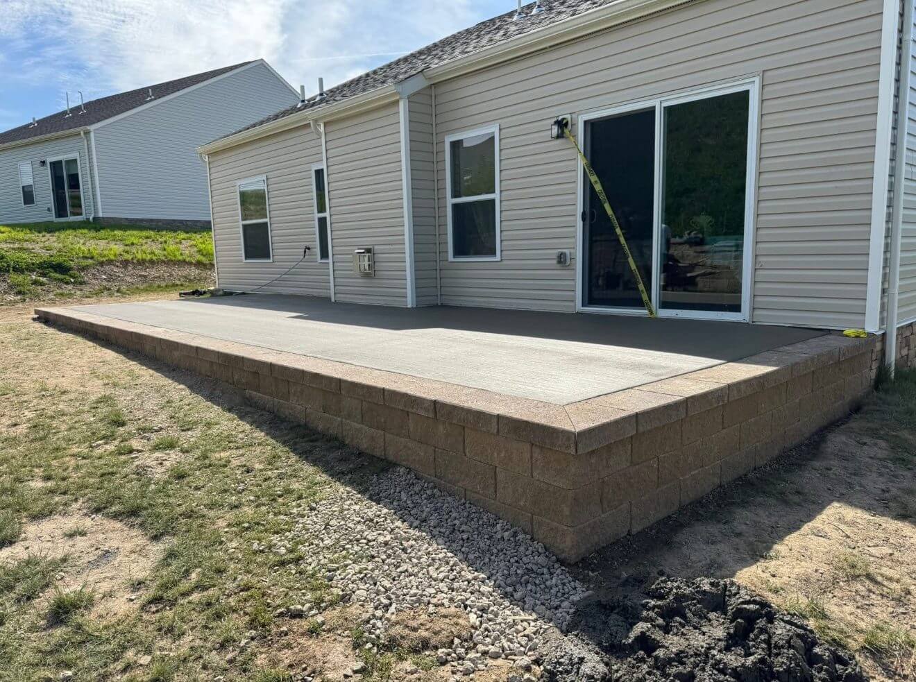 Raised concrete patio installed by B&B Decks in Hampton Roads, VA