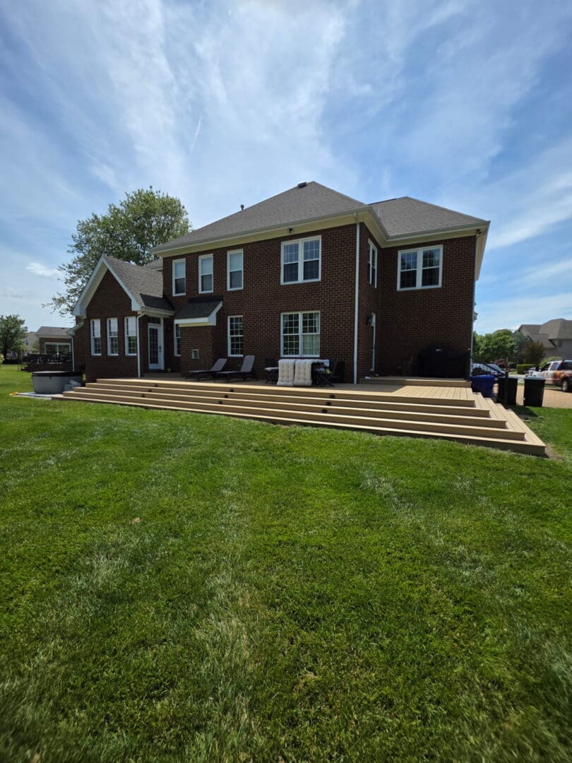 Completed composite deck replacement with upgraded deck boards and railing