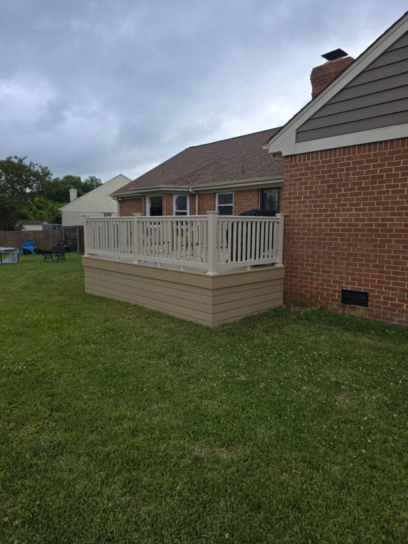 Premium composite deck and outdoor living project by B&B Decks