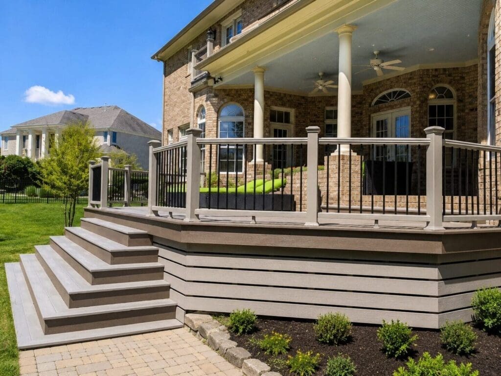 Composite deck with gray boards and steps built by B&B Decks in Hampton Roads